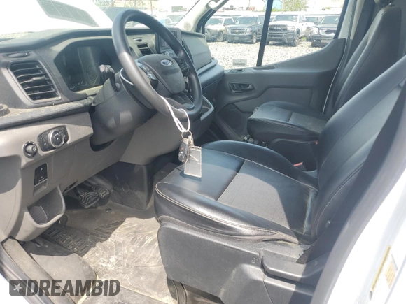 2021 Ford Transit Cargo с VIN 1FTBR1C81MKA80750, выставлен на аукционе Copart как лот 55567135 с пробегом 43 990 миль миль и Чистый • Clean title. История ставок и продаж доступна на DreamBid. Изображение 7.
