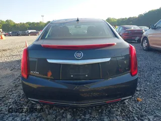 2013 Cadillac XTS Luxury with VIN 2G61P5S3XD9141306, listed as a IAAI auction lot 42034077 with 120,294 mi miles. Bid and sale history available at carsss.com. Image 16.