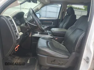2014 Ram 1500 Longhorn Limited with VIN 1C6RR7PTXES440154, listed as a Copart auction lot 58481385 with 201,511 mi miles and Salvage title. Bid and sale history available at DreamBid. Image 7.