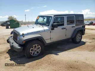 2014 Jeep Wrangler Unlimited Rubicon with VIN 1C4HJWFG1EL241014, listed as a Copart auction lot 63948655 with 165,650 mi miles and Salvage title. Bid and sale history available at DreamBid. Image 1.