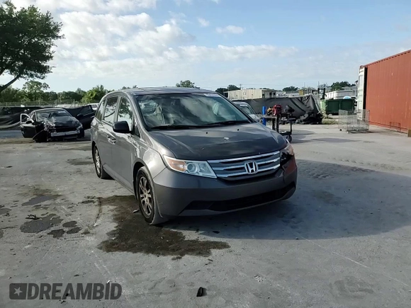 2012 Honda Odyssey EX-L with VIN 5FNRL5H66CB146350, listed as a Copart auction lot 55428555 with 171,207 mi miles and Salvage Title. Bid and sale history available at DreamBid. Image 14.