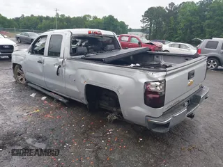 2014 Chevrolet Silverado 1500 LT with VIN 1GCRCREH4EZ395398, listed as a IAAI auction lot 42245009 with 201,552 mi miles and . Bid and sale history available at DreamBid. Image 3.