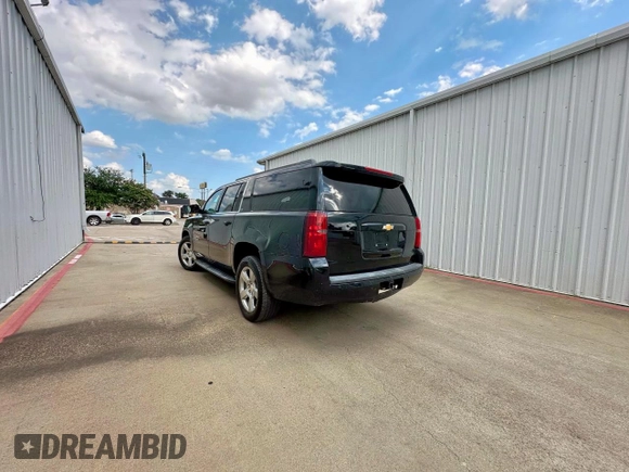 2015 Chevrolet Suburban LT with VIN 1GNSKJKC3FR153922, listed as a Copart auction lot 64337945 with 238,441 mi miles and Clean title. Bid and sale history available at DreamBid. Image 3.