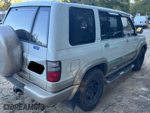 2001 Isuzu Trooper S z VIN JACDJ58X417J03071, wystawiony jako Copart lot #77033444 z przebiegiem 151 982 mil mil oraz Szkody całkowita. Historia ofert i sprzedaży dostępna na DreamBid. Obrazek 4.