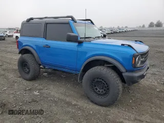 2023 Ford Bronco with VIN 1FMDE5AHXPLB26651, listed as a Copart auction lot 77497964 with 19,700 mi miles and Salvage Title. Bid and sale history available at carsss.com. Image 4.