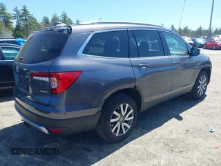 2021 Honda Pilot EX-L with VIN 5FNYF6H59MB016354, listed as a IAAI auction lot 42108020 with 61,436 mi miles and . Bid and sale history available at DreamBid. Image 4.