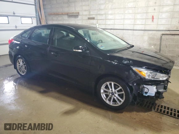 2016 Ford Focus SE with VIN 1FADP3F29GL371728, listed as a Copart auction lot 48871195 with 87,079 mi miles and Salvage Title. Bid and sale history available at carsss.com. Image 4.