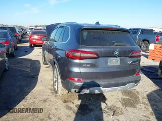 2020 BMW X5 sDrive40i with VIN 5UXCR4C05L9C54889, listed as a IAAI auction lot 41671983 with Not Provided miles and . Bid and sale history available at DreamBid. Image 3.
