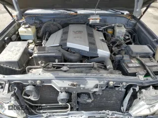 2003 Lexus LX 470 z VIN JTJHT00W633531685, wystawiony jako Copart lot #49729305 z przebiegiem 237 447 mil mil oraz Szkoda całkowita • Salvage title. Historia ofert i sprzedaży dostępna na DreamBid. Obrazek 13.