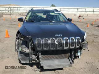 2015 Jeep Cherokee Sport with VIN 1C4PJMAB7FW773265, listed as a Copart auction lot 61134045 with 117,628 mi miles and Salvage title. Bid and sale history available at DreamBid. Image 5.