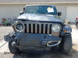 2022 Jeep Wrangler Unlimited Sahara Altitude z VIN 1C4HJXEG6NW103779, wystawiony jako IAAI lot #42563826 z przebiegiem 79 315 mil mil oraz . Historia ofert i sprzedaży dostępna na DreamBid. Obrazek 6.