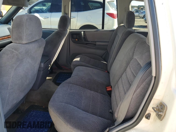 1996 Jeep Grand Cherokee Laredo with VIN 1J4FX58SXTC349575, listed as a Copart auction lot 80545584 with 302,636 mi miles and Salvage Title. Bid and sale history available at carsss.com. Image 10.
