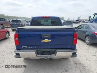 2014 Chevrolet Silverado 1500 LT with VIN 3GCUKREC3EG183710, listed as a IAAI auction lot 42143141 with 288,444 mi miles and . Bid and sale history available at DreamBid. Image 16.