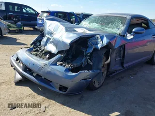 2006 Chrysler Crossfire Limited with VIN 1C3AN69L16X063571, listed as a IAAI auction lot 41353141 with 103,477 mi miles and . Bid and sale history available at DreamBid. Image 6.