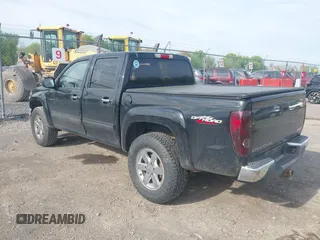 2010 GMC Canyon SLE1 z VIN 1GTJTCDEXA8109443, wystawiony jako IAAI lot #42240716 z przebiegiem 160 500 mil mil oraz . Historia ofert i sprzedaży dostępna na DreamBid. Obrazek 3.