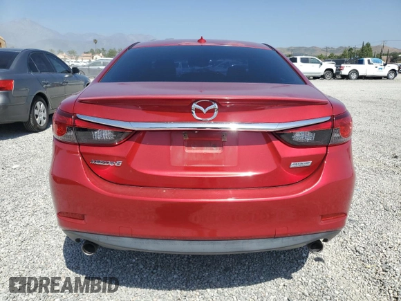 2014 Mazda 6 i Grand Touring с VIN JM1GJ1W64E1121399, выставлен на аукционе Copart как лот 57513405 с пробегом 161 286 миль миль и Списание • Salvage title. История ставок и продаж доступна на DreamBid. Изображение 6.