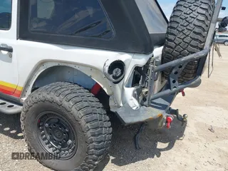 2018 Jeep Wrangler Sport with VIN 1C4GJXAN8JW302519, listed as a IAAI auction lot 42331871 with 51,639 mi miles and . Bid and sale history available at DreamBid. Image 6.