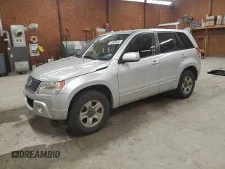2012 Suzuki Grand Vitara Premium z VIN JS3TD0D2XC4100425, wystawiony jako Copart lot #49080815 z przebiegiem 108 780 mil mil oraz Szkody całkowita. Historia ofert i sprzedaży dostępna na DreamBid. Obrazek 1.