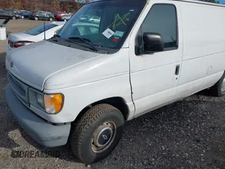 2002 Ford Econoline Cargo with VIN 1FTRE14262HB84357, listed as a IAAI auction lot 40880551 with 123,183 mi miles. Bid and sale history available at carsss.com. Image 6.