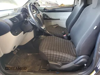 2012 Scion iQ z VIN JTNJJXB09CJ012794, wystawiony jako Copart lot #52983435 z przebiegiem 135 927 mil mil oraz Szkoda całkowita • Salvage title. Historia ofert i sprzedaży dostępna na DreamBid. Obrazek 7.