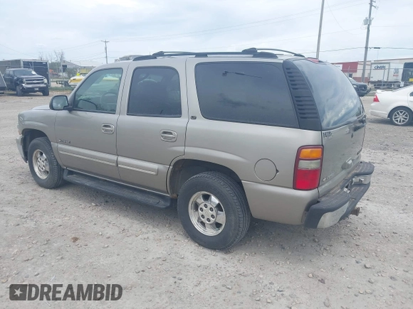 2001 Chevrolet Tahoe LS z VIN 1GNEC13T11J107893, wystawiony jako IAAI lot #42261213 z przebiegiem 338 454 mil mil oraz . Historia ofert i sprzedaży dostępna na DreamBid. Obrazek 3.