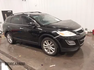 2011 Mazda CX-9 Grand Touring z VIN JM3TB3DA8B0329437, wystawiony jako IAAI lot #42243017 z przebiegiem 250 572 mil mil oraz . Historia ofert i sprzedaży dostępna na DreamBid. Obrazek 1.