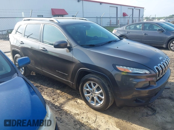 2014 Jeep Cherokee Latitude with VIN 1C4PJLCB6EW241897, listed as a IAAI auction lot 42128880 with 126,242 mi miles. Bid and sale history available at carsss.com. Image 1.