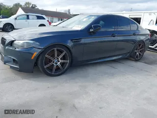 2013 BMW M5 with VIN WBSFV9C59DD096774, listed as a IAAI auction lot 41608286 with 82,601 mi miles. Bid and sale history available at carsss.com. Image 17.