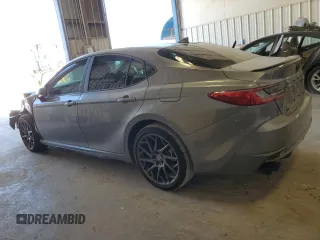 2025 Toyota Camry LE with VIN 4T1DAACKXSU556793, listed as a Copart auction lot 50574875 with 5,908 mi miles and Salvage Title. Bid and sale history available at carsss.com. Image 2.