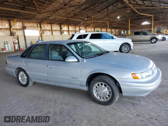1995 Ford Taurus GL z VIN 1FALP524XSG154141, wystawiony jako Copart lot #77271544 z przebiegiem 72 118 mil mil oraz Czysty tytuł • Clean title. Historia ofert i sprzedaży dostępna na DreamBid. Obrazek 4.