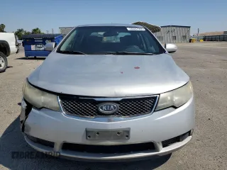 2010 Kia Forte EX z VIN KNAFU4A24A5054277, wystawiony jako Copart lot #56007995 z przebiegiem 218 782 mil mil oraz Szkody całkowita. Historia ofert i sprzedaży dostępna na DreamBid. Obrazek 5.