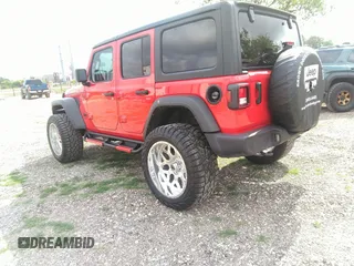 2024 Jeep Wrangler Sport S with VIN 1C4PJXDNXRW110431, listed as a IAAI auction lot 42156570 with 9,699 mi miles. Bid and sale history available at carsss.com. Image 3.