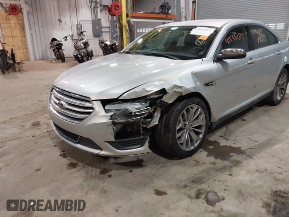 2013 Ford Taurus Limited with VIN 1FAHP2F83DG116657, listed as a IAAI auction lot 41533075 with 124,649 mi miles. Bid and sale history available at carsss.com. Image 6.
