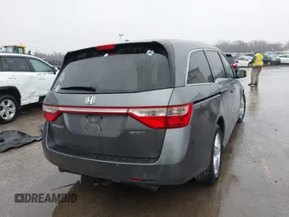 2011 Honda Odyssey Touring Elite with VIN 5FNRL5H9XBB090616, listed as a IAAI auction lot 41944510 with 207,962 mi miles and . Bid and sale history available at DreamBid. Image 4.