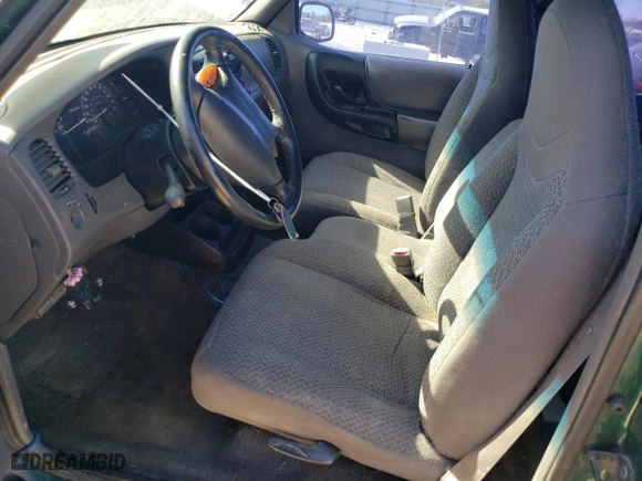 1999 Ford Ranger XLT with VIN 1FTYR11X7XTA88063, listed as a Copart auction lot 75098214 with 210,807 mi miles and Salvage Title. Bid and sale history available at carsss.com. Image 7.