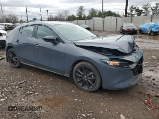 2024 Mazda 3 S Carbon Edition with VIN JM1BPBLM7R1656105, listed as a Copart auction lot 49141345 with 20,596 mi miles and Salvage title. Bid and sale history available at DreamBid. Image 4.