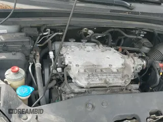 2006 Honda Odyssey Touring with VIN 5FNRL38876B100889, listed as a IAAI auction lot 43293666 with 184,862 mi miles and . Bid and sale history available at DreamBid. Image 17.