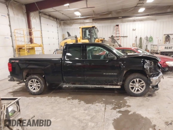2016 Chevrolet Silverado 1500 LT with VIN 1GCVKREC5GZ176474, listed as a IAAI auction lot 41983780 with 118,587 mi miles and . Bid and sale history available at DreamBid. Image 13.