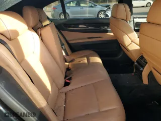 2011 BMW 7 Series 740Li with VIN WBAKB4C54BC574973, listed as a Copart auction lot 82299024 with 0 mi miles and Salvage Title. Bid and sale history available at carsss.com. Image 10.
