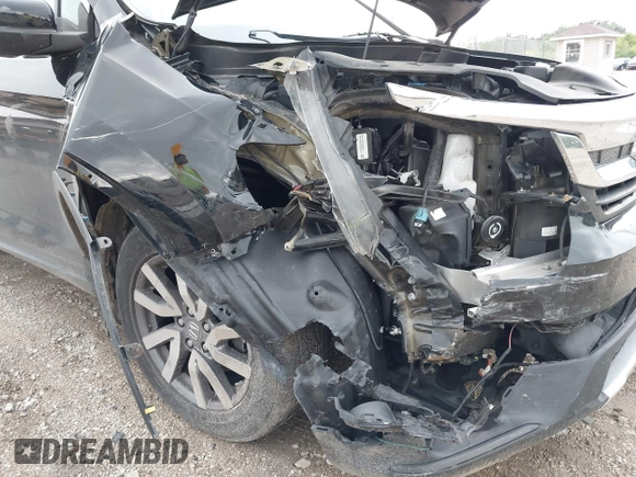 2020 Honda Pilot EX-L with VIN 5FNYF6H57LB059332, listed as a IAAI auction lot 42614422 with 110,279 mi miles and . Bid and sale history available at DreamBid. Image 6.
