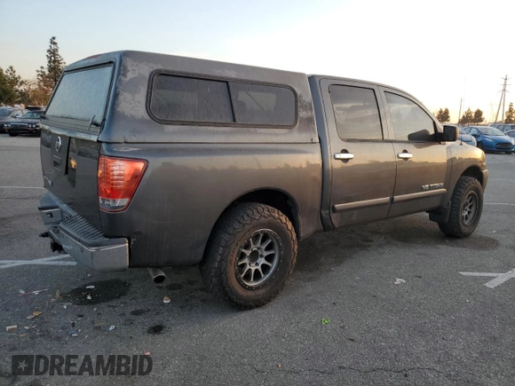 2007 Nissan Titan XE with VIN 1N6AA07A07N217705, listed as a Copart auction lot 86836804 with 272,228 mi miles and Salvage Title. Bid and sale history available at DreamBid. Image 3.
