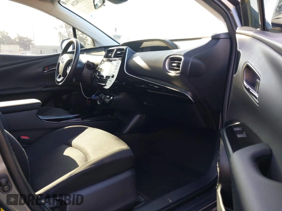 2021 Toyota Prius LE with VIN JTDKAMFP1M3195662, listed as a IAAI auction lot 42799476 with 47,560 mi miles and . Bid and sale history available at DreamBid. Image 5.