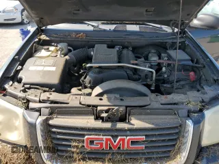 2004 GMC Envoy SLT with VIN 1GKDT13SX42423677, listed as a Copart auction lot 69012884 with Not Provided miles and Clean Title. Bid and sale history available at carsss.com. Image 12.