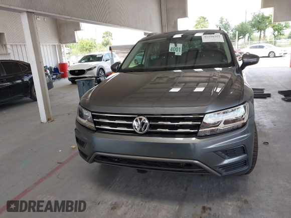 2021 Volkswagen Tiguan S z VIN 3VV1B7AX0MM030915, wystawiony jako IAAI lot #42198262 z przebiegiem 47 500 mil mil oraz . Historia ofert i sprzedaży dostępna na DreamBid. Obrazek 12.
