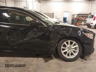 2016 Mazda 6 i Sport with VIN JM1GJ1U57G1433732, listed as a IAAI auction lot 41879844 with 107,269 mi miles and . Bid and sale history available at DreamBid. Image 6.