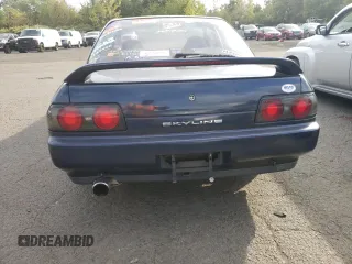 1989 Nissan Skyline z VIN HNR32002973, wystawiony jako Copart lot #73699504 z przebiegiem 72 824 mil mil oraz Szkoda całkowita • Salvage title. Historia ofert i sprzedaży dostępna na DreamBid. Obrazek 6.