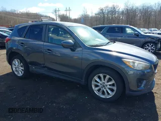 2013 Mazda CX-5 Grand Touring with VIN JM3KE4DE1D0164488, listed as a IAAI auction lot 41683326 with 129,989 mi miles. Bid and sale history available at carsss.com. Image 18.