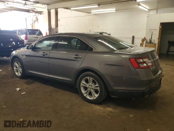 2014 Ford Taurus SEL z VIN 1FAHP2E85EG146469, wystawiony jako Copart lot #59506195 z przebiegiem 158 124 mil mil oraz Szkoda całkowita • Salvage title. Historia ofert i sprzedaży dostępna na DreamBid. Obrazek 2.