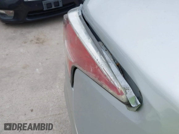 2014 Nissan Altima S with VIN 1N4AL3AP4EC323133, listed as a IAAI auction lot 42159999 with 162,502 mi miles and . Bid and sale history available at DreamBid. Image 6.
