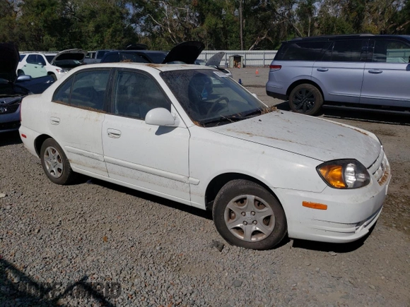 2005 Hyundai Accent GLS with VIN KMHCG45C55U664731, listed as a Copart auction lot 80205574 with 170,335 mi miles and Salvage Title. Bid and sale history available at carsss.com. Image 4.